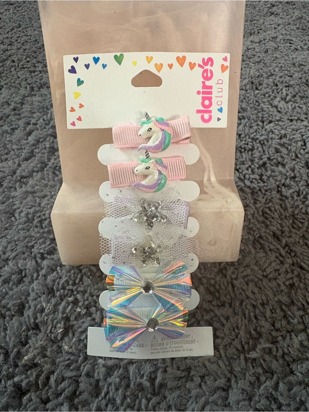 NWT set of 6 hair clips - 2 unicorns, 2 sparkly stars, and 2 iridescent bows